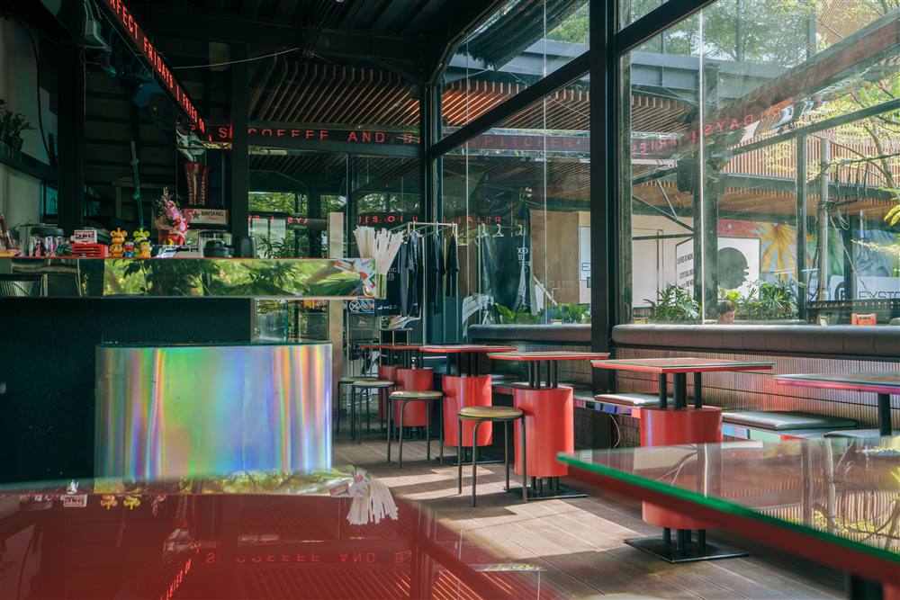 Lounge seating and greenery beside the ALTRS bar